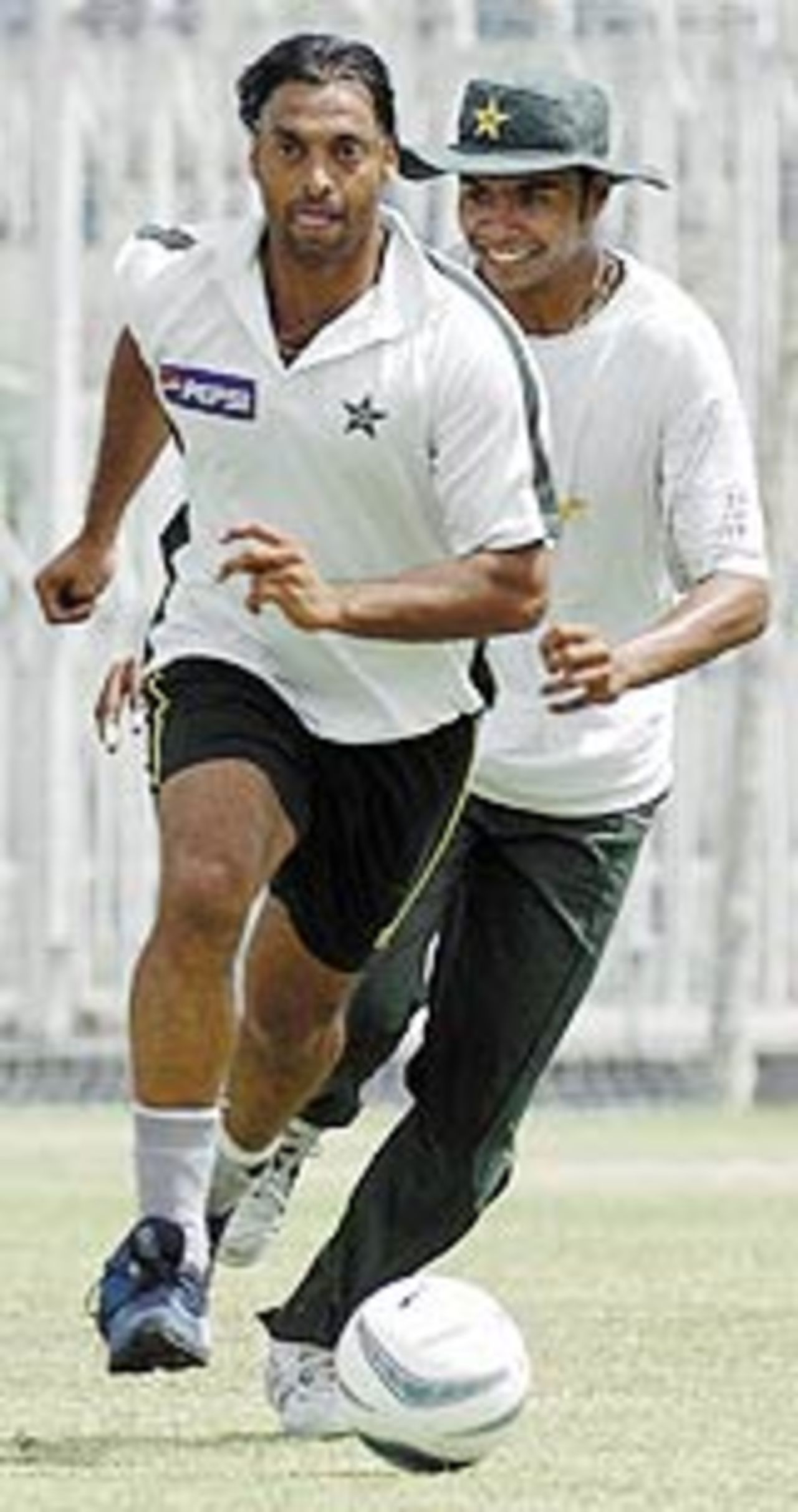 Shoaib Akhtar and Danish Kaneria play some football, Rawalpindi, April 11, 2004