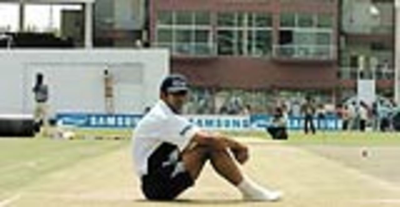 Rahul Dravid sits on the pitch of the Pindi Cricket Stadium, Rawalpindi, April 12, 2004
