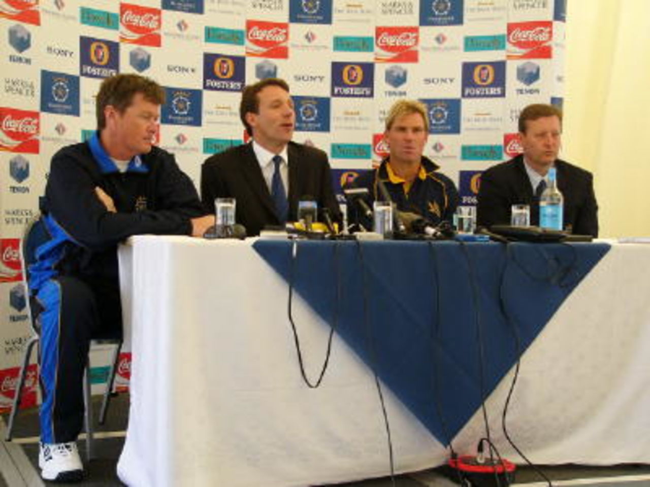 Shane Warne, flanked by Paul Terry (Team Manager), Nick Pike (Managing Director, Rose Bowl plc) and Tim Tremlett (Director of Cricket).