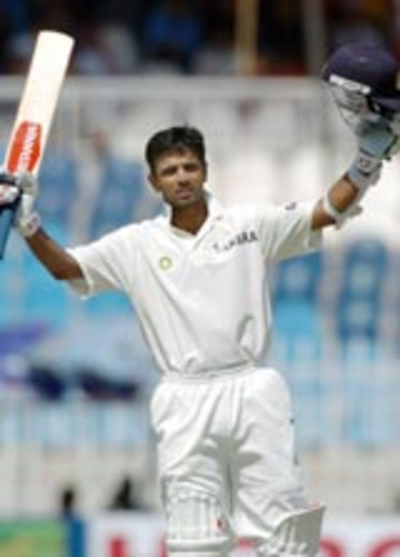 Rahul Dravid raises bat and helmet to acknowledge his double-century, Pakistan v India, 3rd Test, Rawalpindi, 3rd day, April 15, 2004