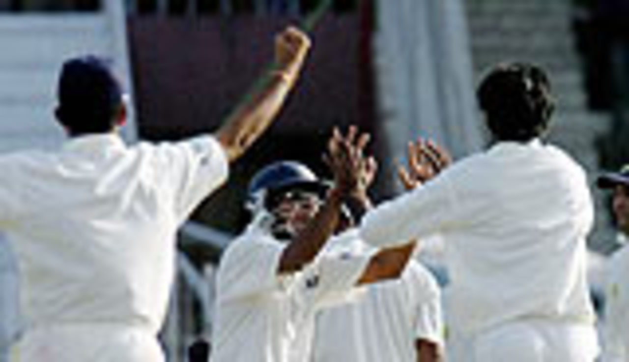 The Indian fielders celebrate a wicket, Pakistan v India, 3rd Test, Rawalpindi, 3rd day, April 15, 2004