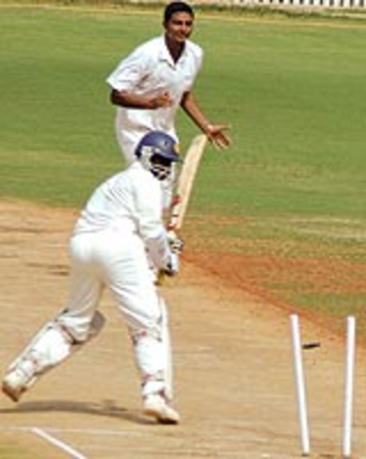 VRV Singh in action, clean-bowling S Sriram
