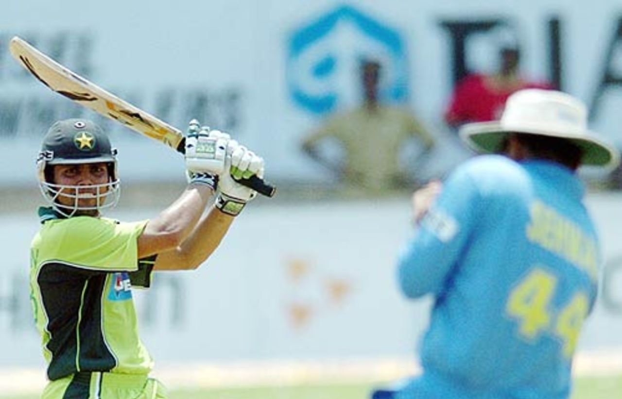 Kamran Akmal's luck runs out moments later, as Virender Sehwag holds on to the catch, India v Pakistan, 1st ODI, Kochi, April 2, 2005
