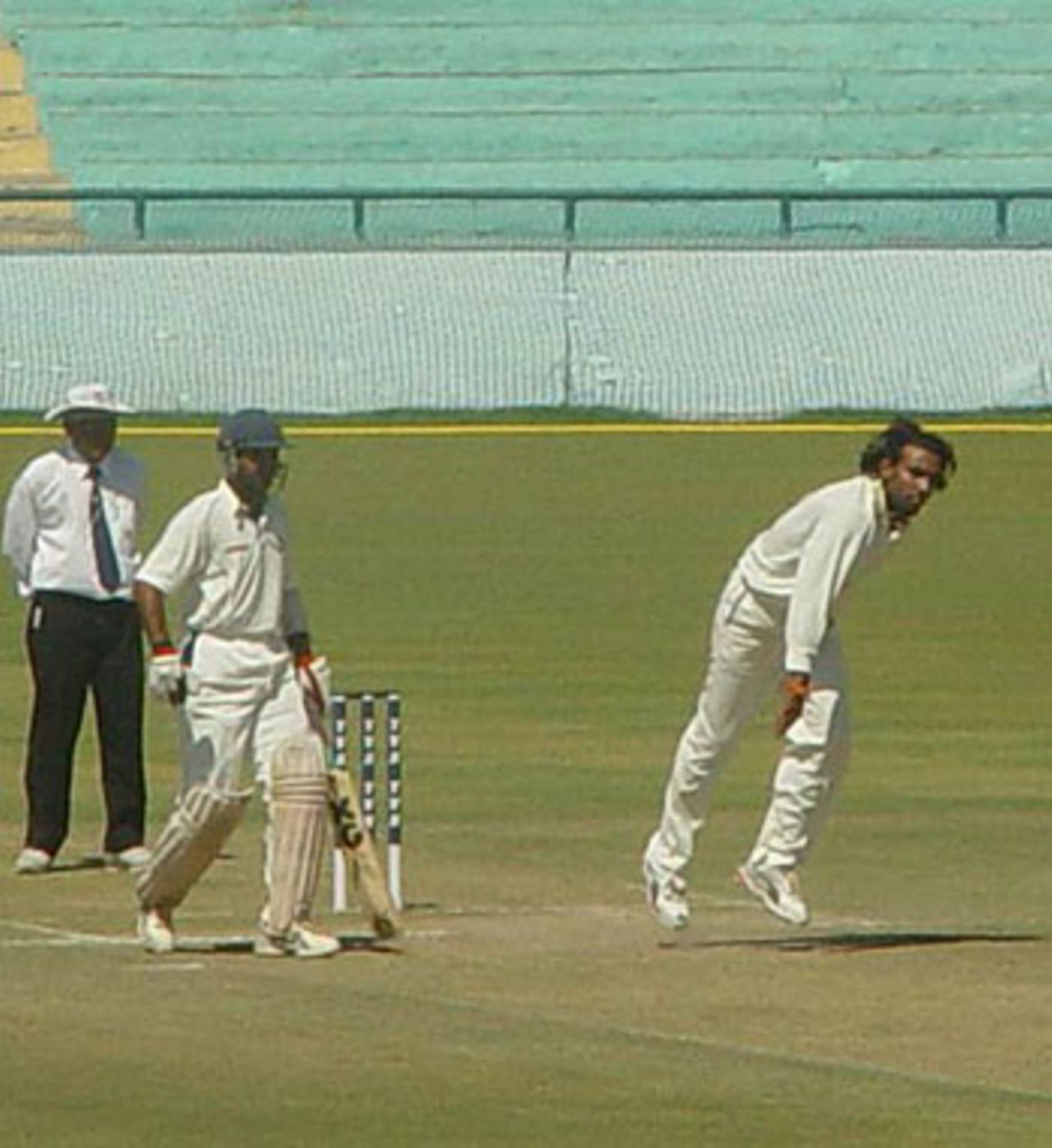 JP Yadav bowls for Railways in the Ranji Trophy final, April 2005