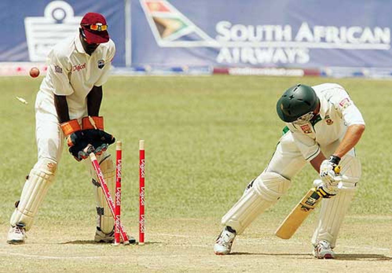 Chris Gayle bowls Andre Nel, as West Indies wrap up South Africa's first innings at Trinidad, April 11, 2005