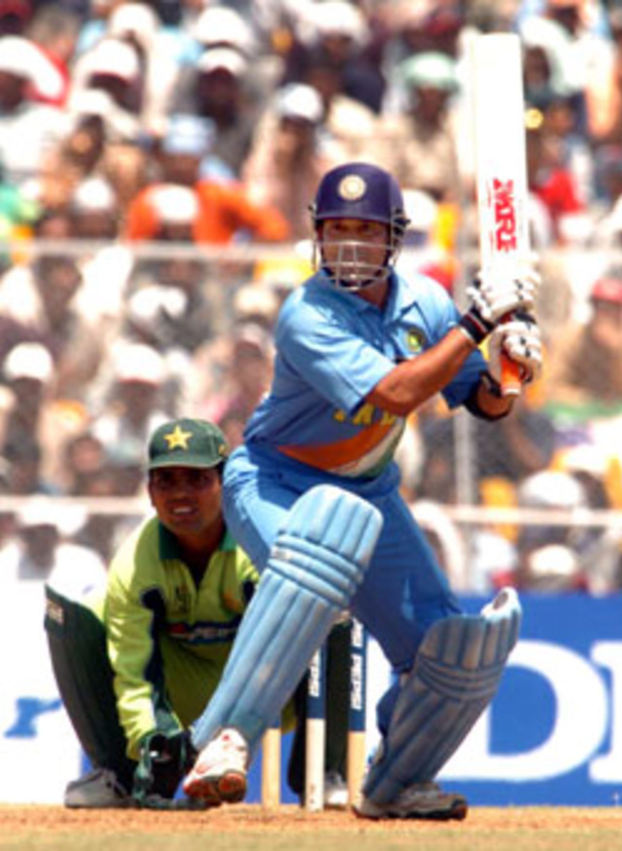 It was a treat for all Sachin Tendulkar fans - his 38th One Day International century was blended with some elegant strokes and cheeky looking paddle sweeps, reverse sweeps and late cuts past the wicket keeper. It finally brought to an end his bad form., India v Pakistan, 4th ODI, Ahmedabad, April 12, 2005