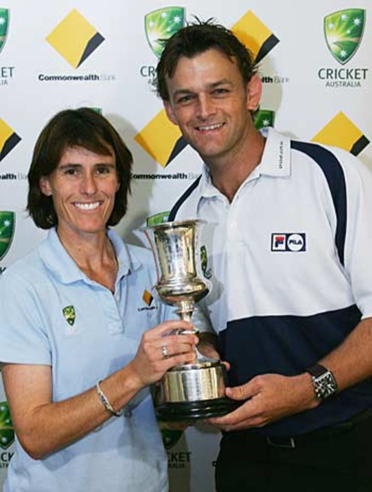 Belinda Clark and Adam Gilchrist pose with the World Cup, Perth, April 13, 2005