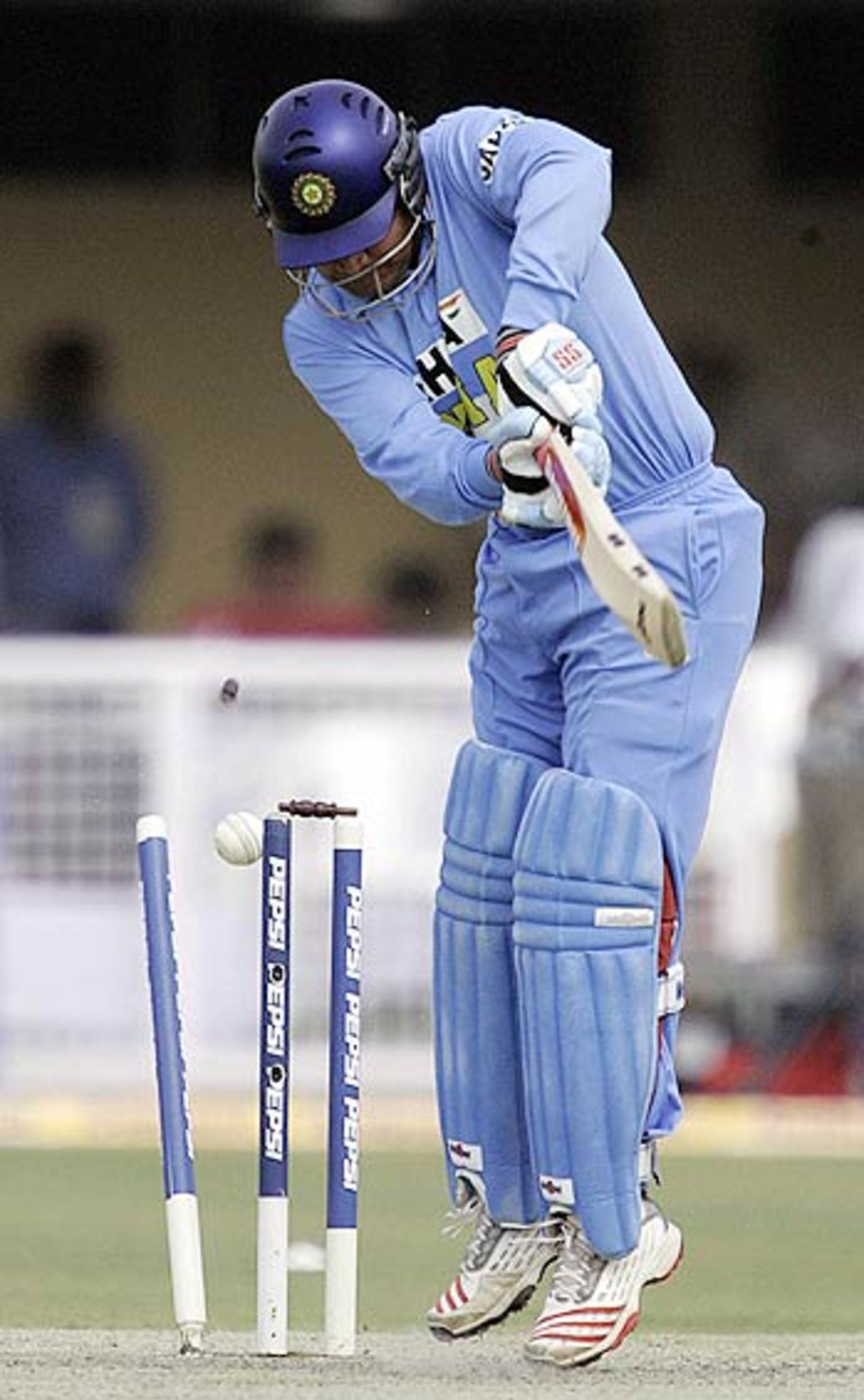 Virender Sehwag sees his stumps shattered by Naved-ul-Hasan, India v Pakistan, 5th ODI, Kanpur, April 15, 2005