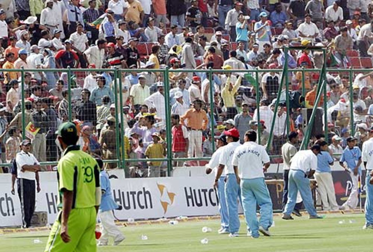 Play was held up due to bottle throwing from a section of the crowd, India v Pakistan, 6th ODI, Delhi, April 17, 2005