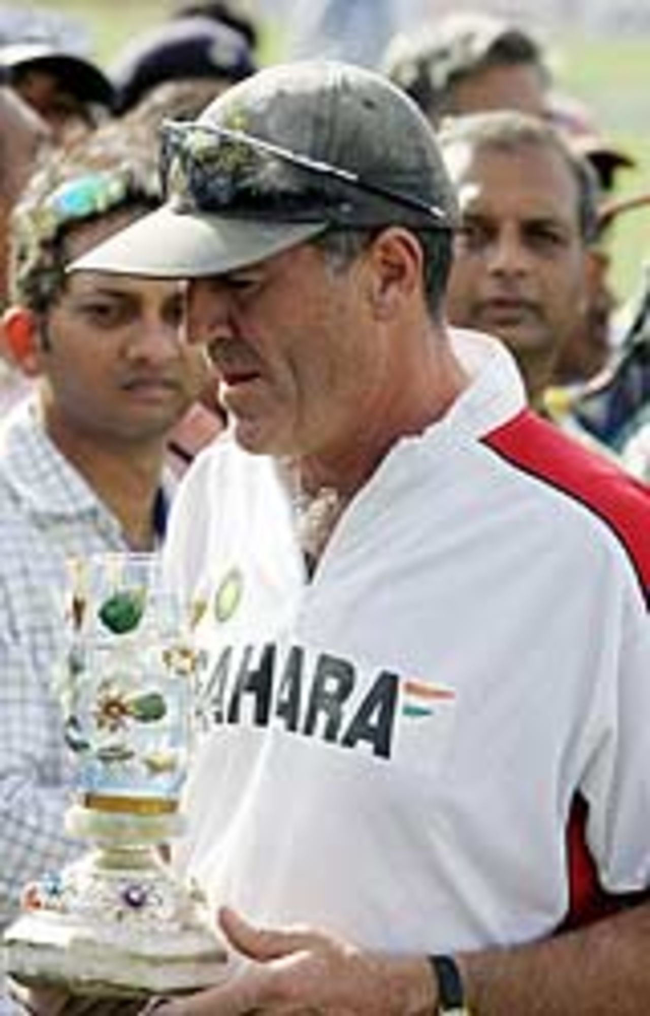 John Wright accepts a reward after his last game as Indian coach, India v Pakistan, 6th ODI, Delhi, April 17, 2005