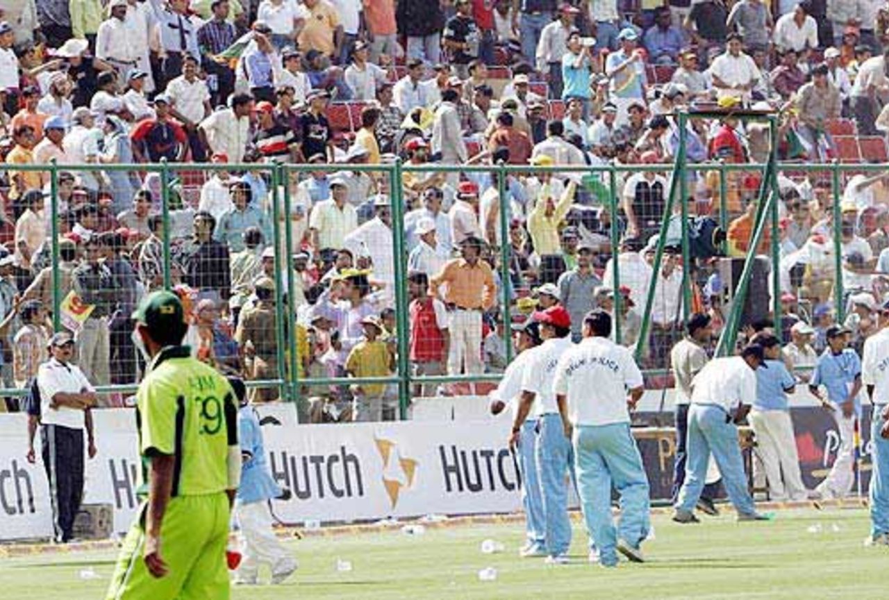 A flurry of wickets brought a downpour of bottles onto the ground, India v Pakistan, 6th ODI, Delhi, April 17, 2005