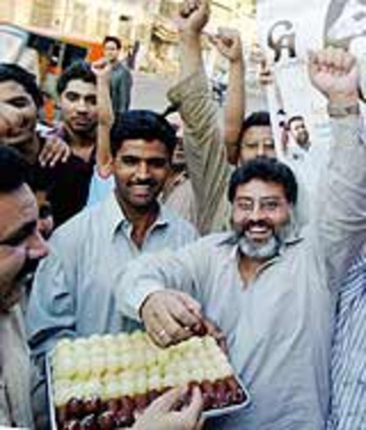 Pakistani supporters rejoice their team's one-day series win, April 18, 2005