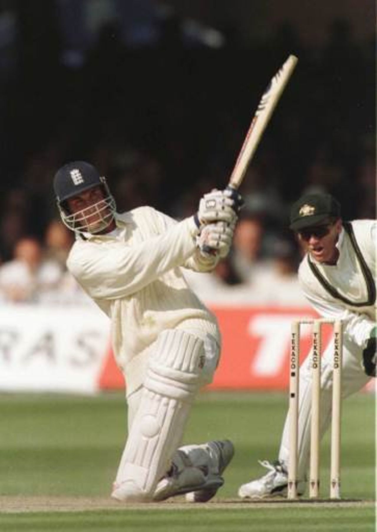Mike Atherton holds the Texaco trophy aloft at Lord's after the England team win the series 3-0.
