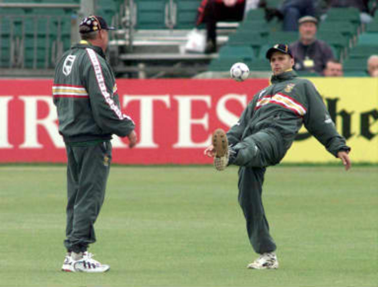Gary Kirsten juggles a football with a teammate whilst waiting for the rain to stop - abandoned Sussex - South Africa World Cup warm up match  07 May 1999
