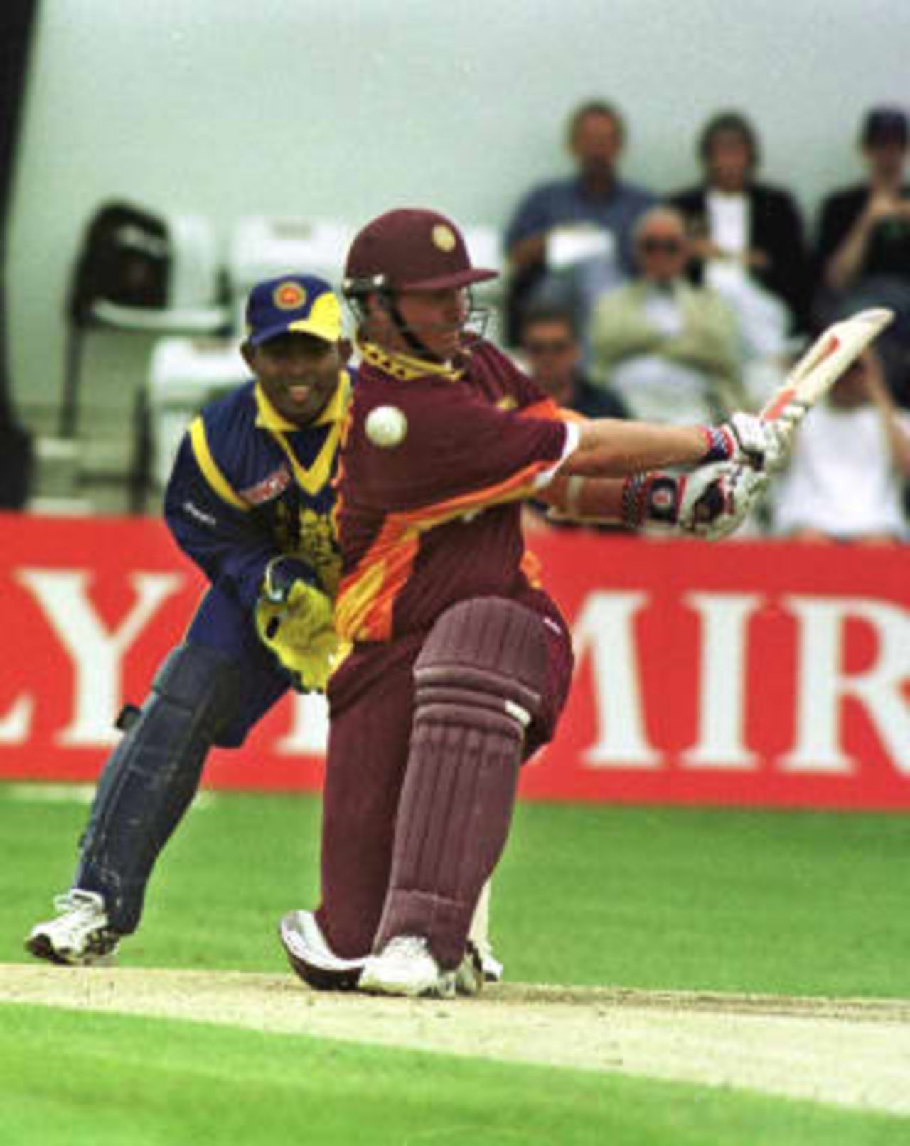 Kaluwitharana keeps his eye on the ball as David Sales sweeps - Sri Lanka - Northamptonshire World cup warm up game, 7 May 1999