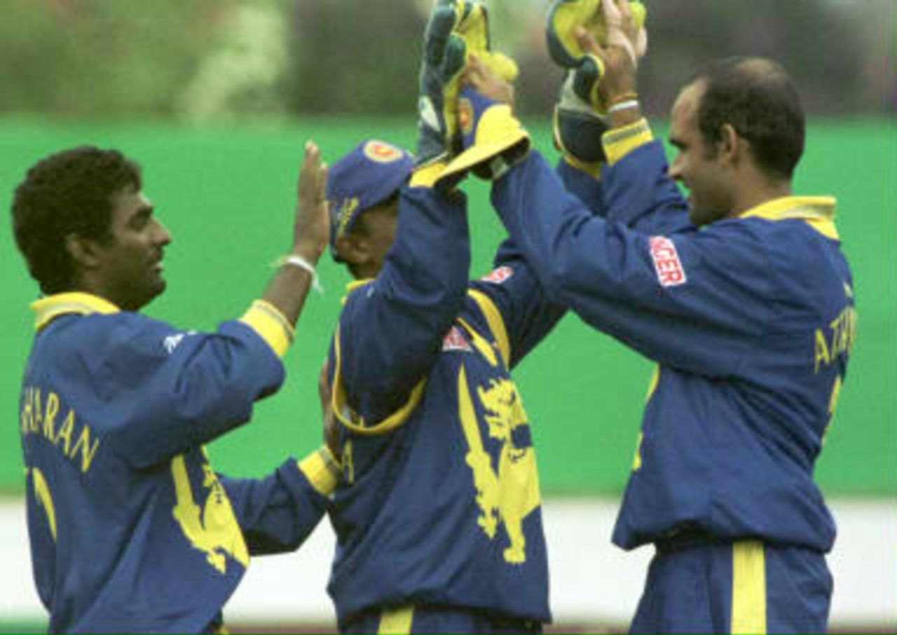 Muralitharan and Kaluwitharana congratulate Attapattu on catching Sales - Sri Lanka - Northamptonshire World cup warm up game, 7 May 1999
