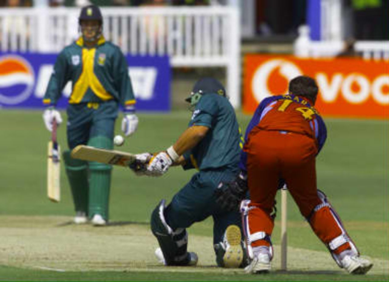 Jacques Kallis sweeps watched by  Herschelle Gibbs - World Cup warm up match, South Africa v  Kent at Canterbury 09 May 99.