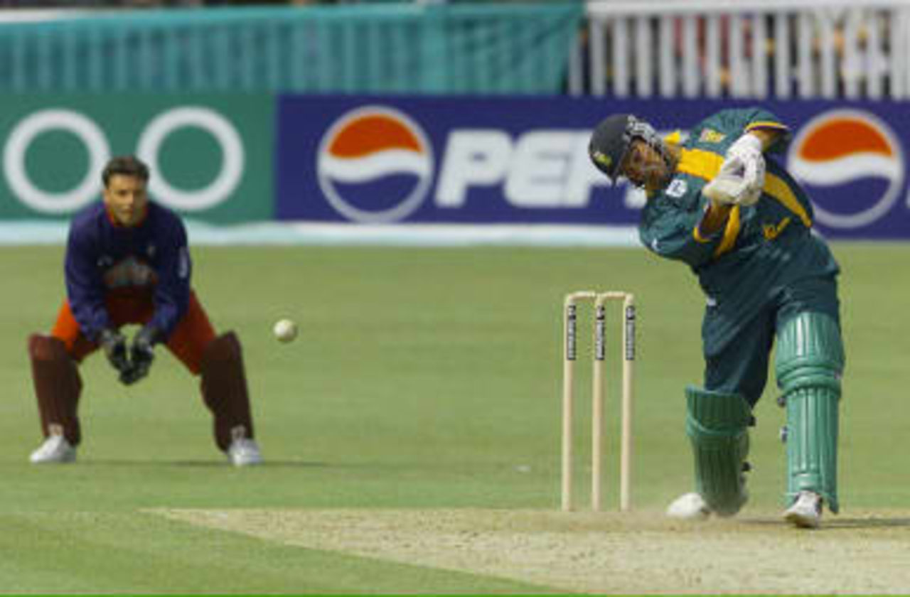 Mark Boucher drives - World Cup warm up match, South Africa v  Kent at Canterbury 09 May 99.