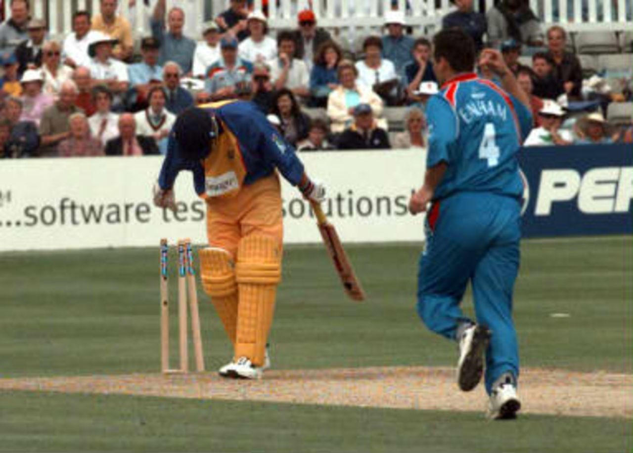 Tim Walton is clean bowled by Mark Ealham  - World Cup warm-up match, England v Essex, Chelmsford, Essex, 09 May 1999.