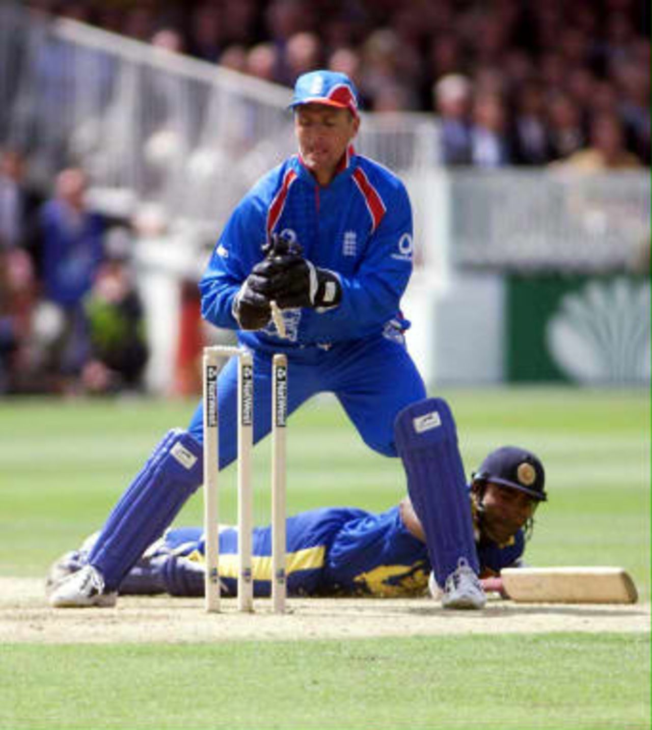 Sri Lankan batsman Romesh Kaluwitharana narrowly escapes England's wicketkeeper Alec Stewart running him out on 48, during their opening Cricket World Cup match against Sri Lanka at Lord's 14 May 1999.  Kaluwitharana was later out for 52, caught Stewart.