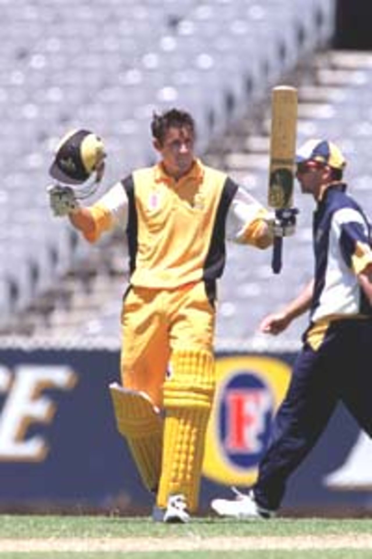 5 Dec 1999: Mike Hussey of Western Australia celebrates his century, during the one day Mercantile Mutual Cup match between Victoria and Western Australia at the Melbourne Cricket Ground, Melbourne, Australia. Western Australia won by 29 runs.