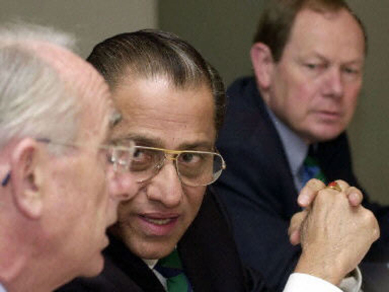 Jagmohan Dalmiya (c) President of the Executive Board of the International Cricket Council with David Richards, Chief Executive (r) and Malcom Gray, President Elect at their meeting at Lords 02 May 2000. The Board were meeting in the hope decisive steps can be taken towards cleaning up the sport in the wake of recent allegations of match-fixing. The two-day assembly of the world governing body has been called in the aftermath of the Hansie Cronje scandal and the numerous other leading figures who have also claimed to have been approached for 'information' to aid illegal betting syndicates on the sub-continent.