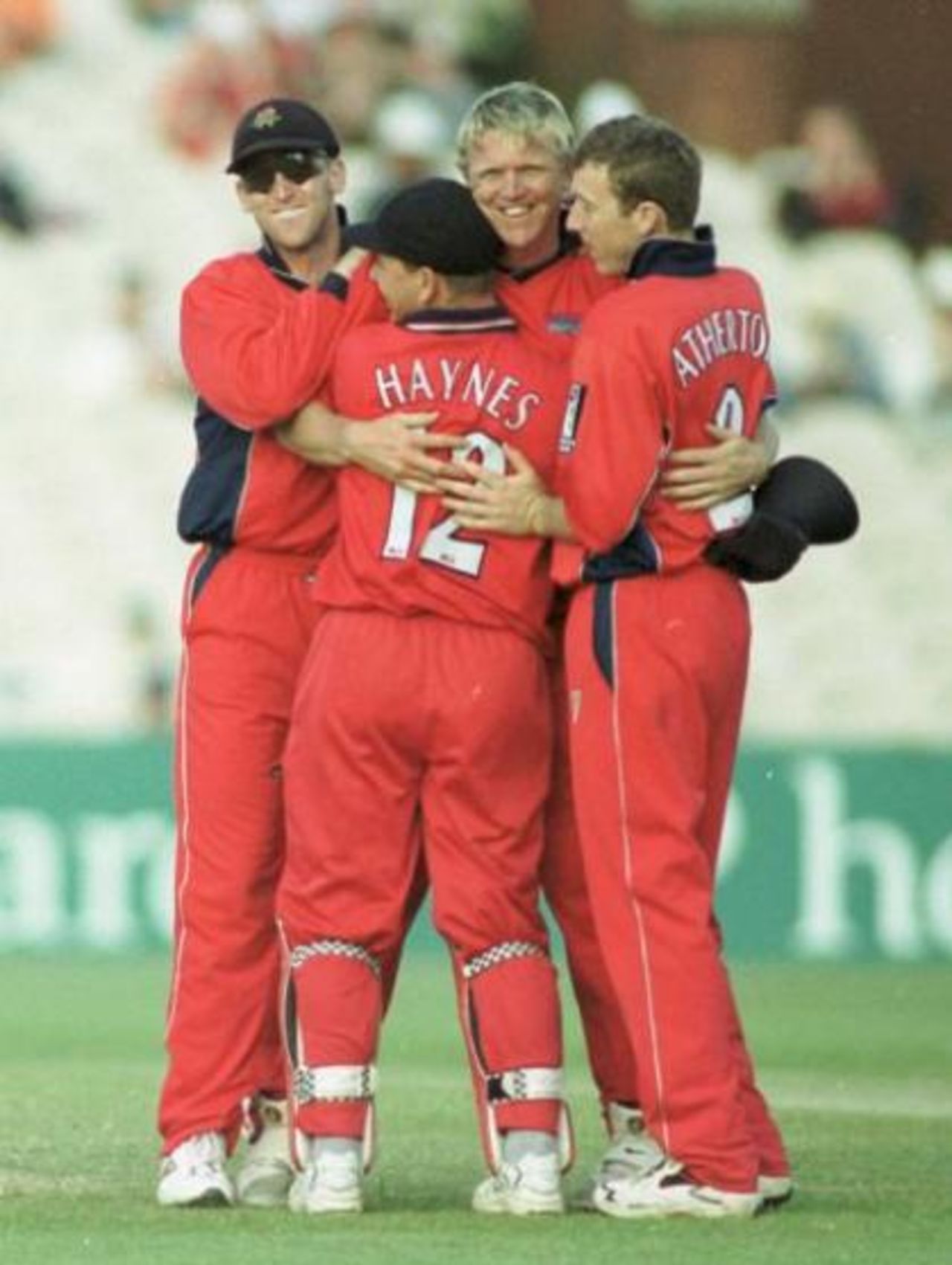 Peter Martin is congratulated on bowling DeFreitas, Old Trafford 7 May 2000