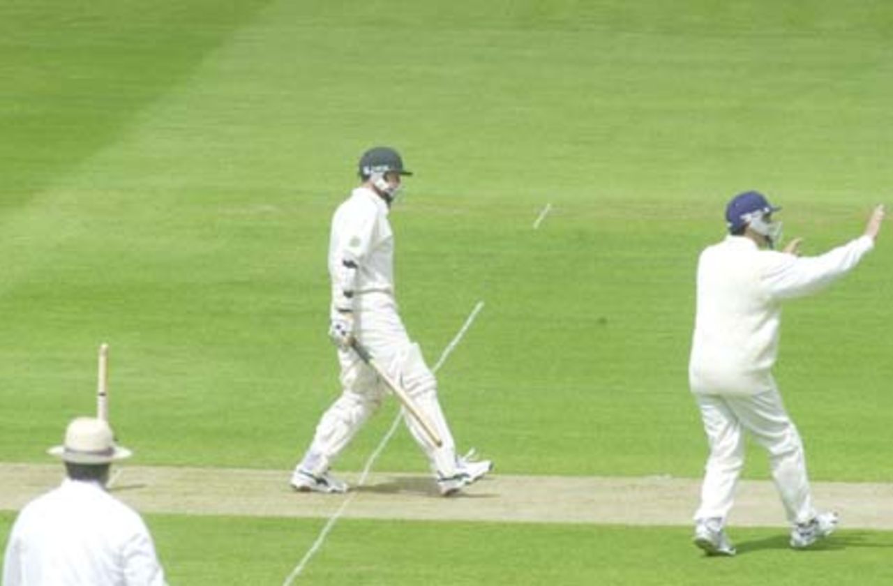 Flower hangs out his bat at a ball from Giddins, caught by Atherton in the slips