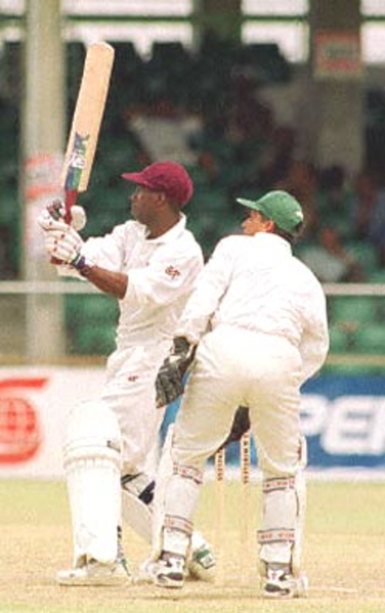 West Indies opening batsman Sherwin Campbell (L) pulls Pakistani bowler Saqlain Mushtaq for 06 on the second Cable & Wireless Test Pakistan in West Indies, West Indies v Pakistan  Kensington Oval, Bridgetown, Barbados (18-22 May 2000) Day 2