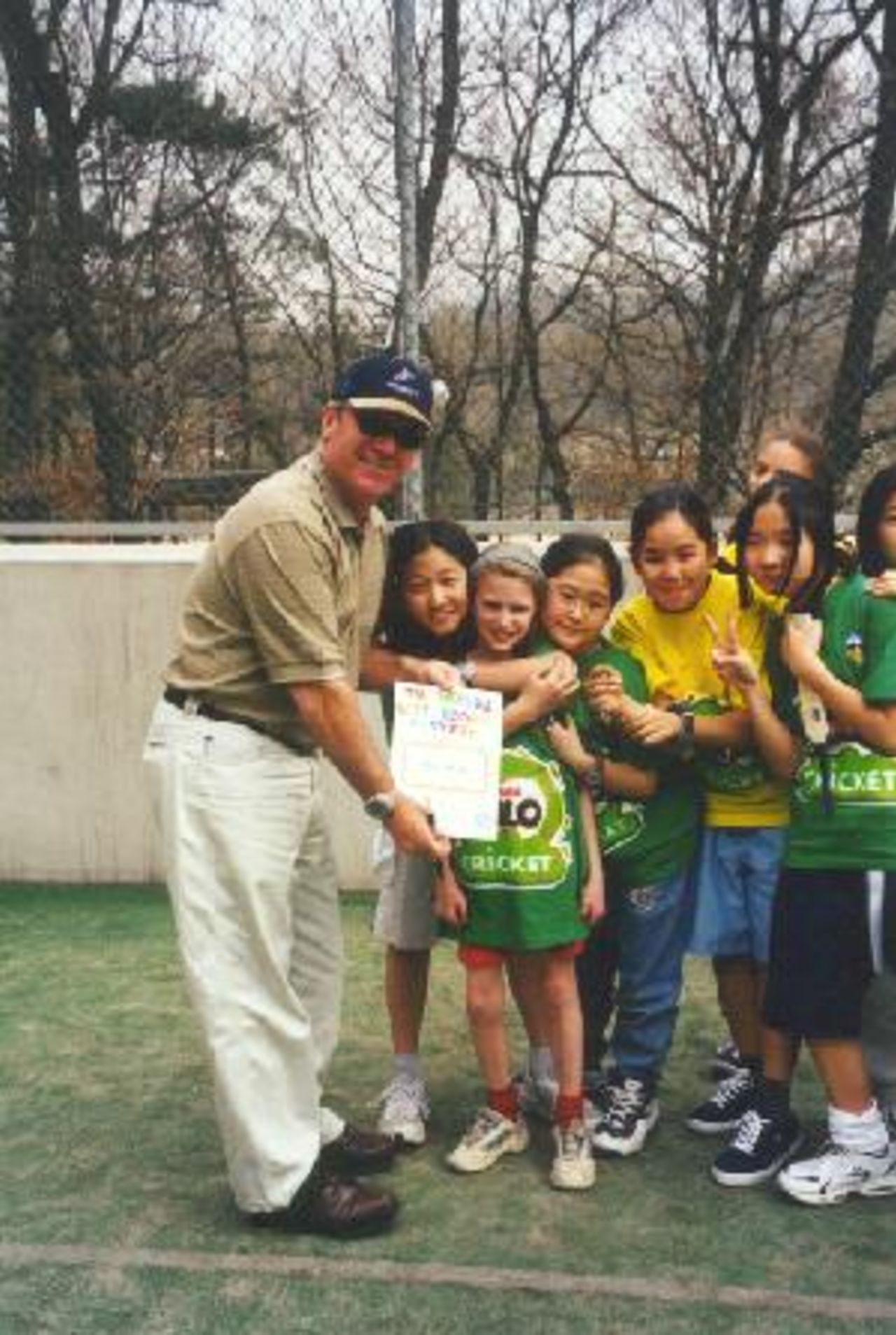 Allan Border with children in Seoul