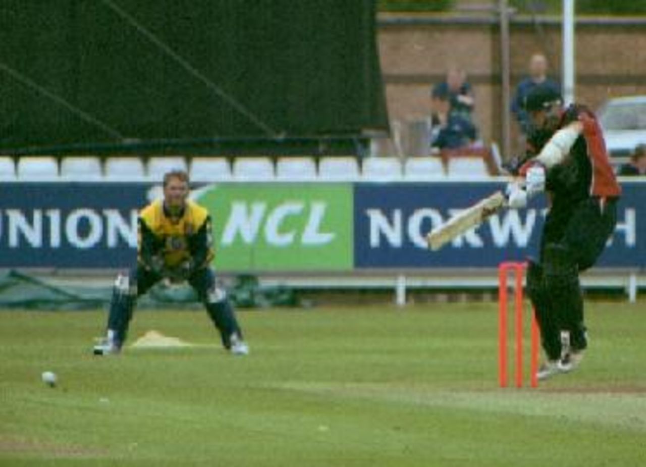 Robert Croft cuts the ball