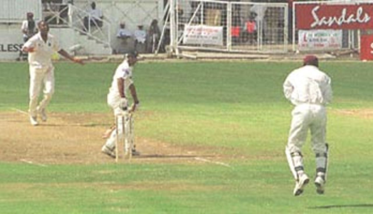 Pakistani Abdur Razzaq (C) is caught behind the wicket keeper Ridley Jacobs (R) off Courtney Walsh, 25 May, 2000 on the first day of the third Cable & Wireless test at Antigua. Pakistan in West Indies 1999/00, 3rd Test, West Indies v Pakistan, Antigua Recreation Ground, St John's, Antigua, 25-29 May 2000 (Day 1)