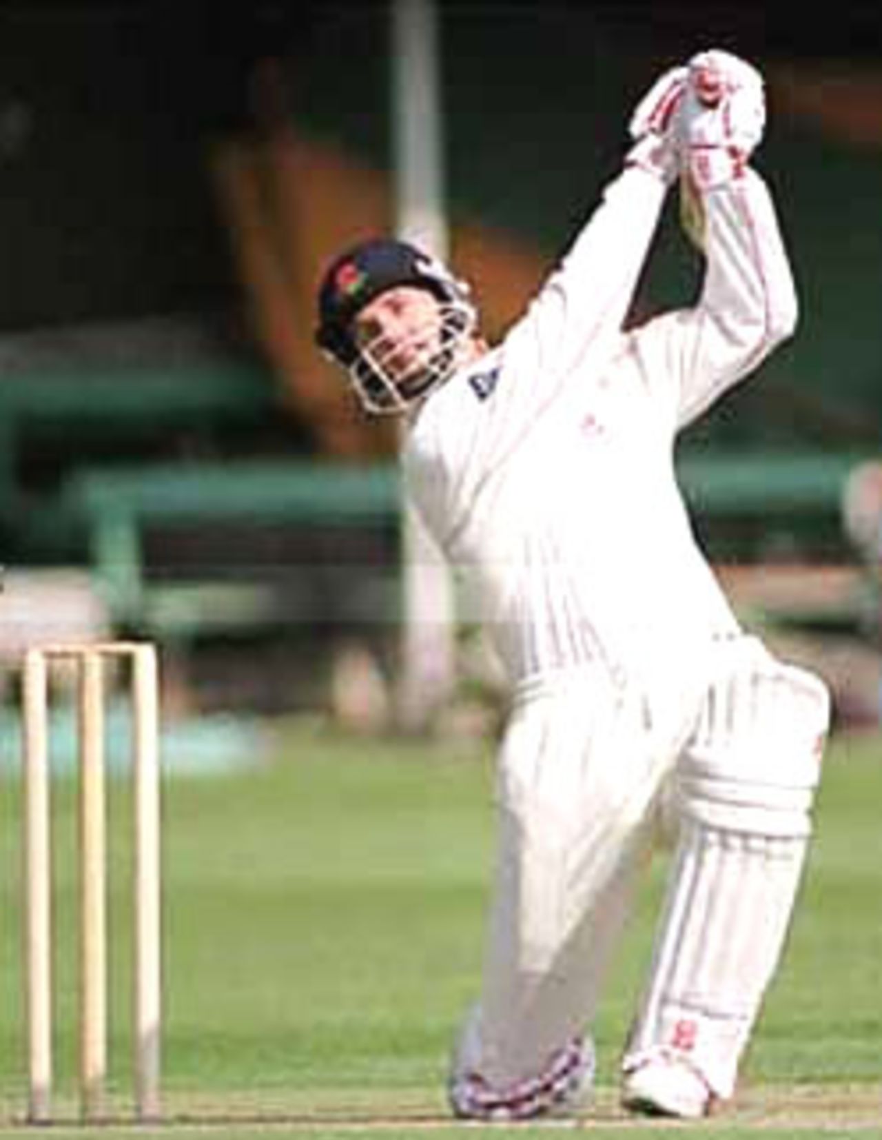 John Crawley lifts the ball to long off, University Match, 2000, Cambridge University v Lancashire University, F.P.Fenner's Ground, Cambridge, 7-9 Apr 2000.