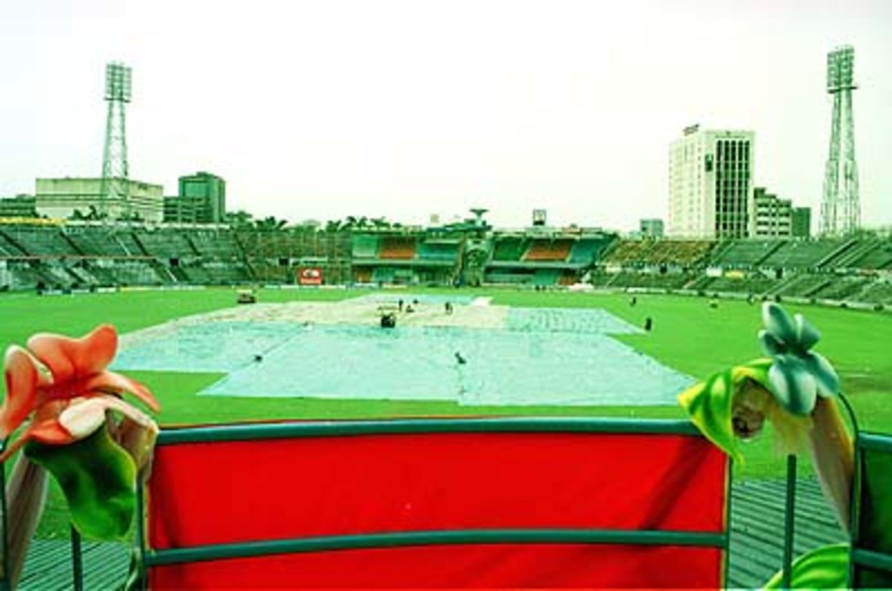 Ground-staff try in vain to clear the water at the flooded Bangabandhu stadium, Asia Cup, Bangababdhu stadium, Dhaka.