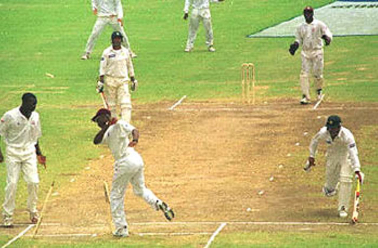 Abdur Razzaq is run out by Franklin Rose off Reon King on the fourth day of their third and deciding Cable & Wireless test, pitting West Indies against the Pakistan at Antigua. Pakistan in West Indies 1999/00, 3rd Test, West Indies v Pakistan, Antigua Recreation Ground, St John's, Antigua, (25-29 May 2000) Day 4.