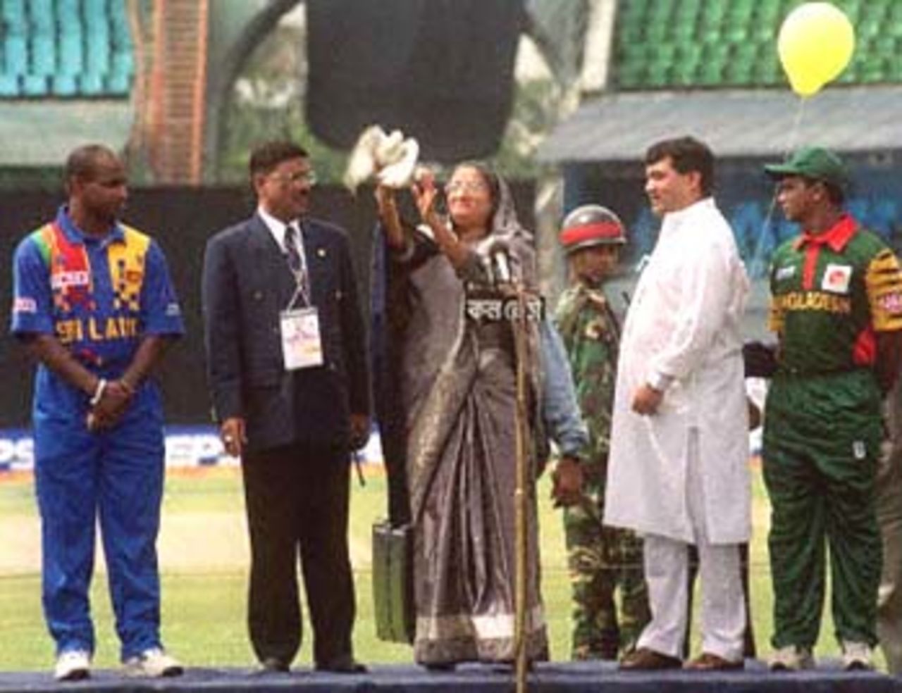 Bangladesh Prime Minister Sheikh Hasina Wajed (C) releases a dove to inaugurate the four-nation Asia Cup limited-overs tournament at the Bangabandhu National Stadium on 29 May 2000. Extreme left is Sri Lanka's captain Sanath Jayasuriya and extreme right is Bangladesh skipper Aminul Islam. India and Pakistan are the other teams in the tournament to decide the regional one-day champions. Bangladesh v Sri Lanka, Asia Cup, 1999/00, Bangabandhu National Stadium, Dhaka 29 May 2000.