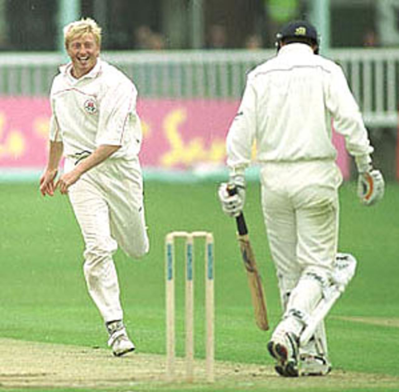 Glen Chapple is all smiles with a wicket of his first delivery, PPP healthcare County Championship Division One, 2000, Kent v Lancashire, St Lawrence Ground, Canterbury, 26-29 Apr 2000.