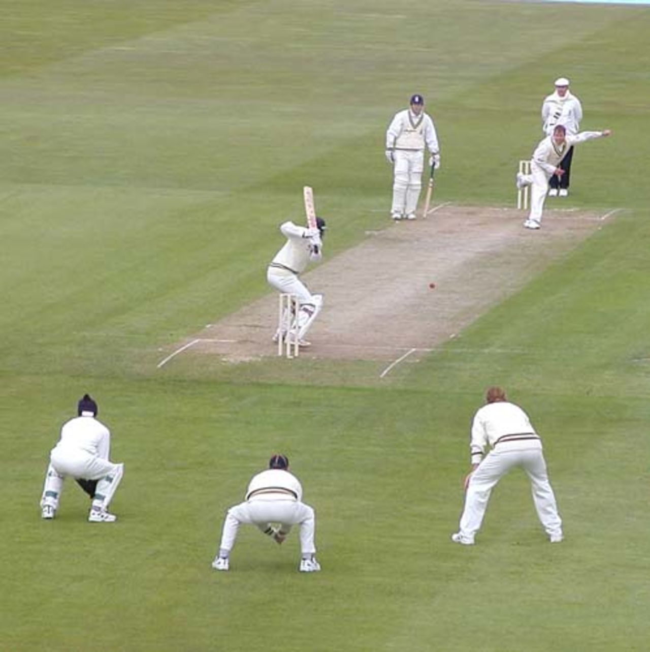 Neil Johnson braves the cold whilst bowling at Edgbaston