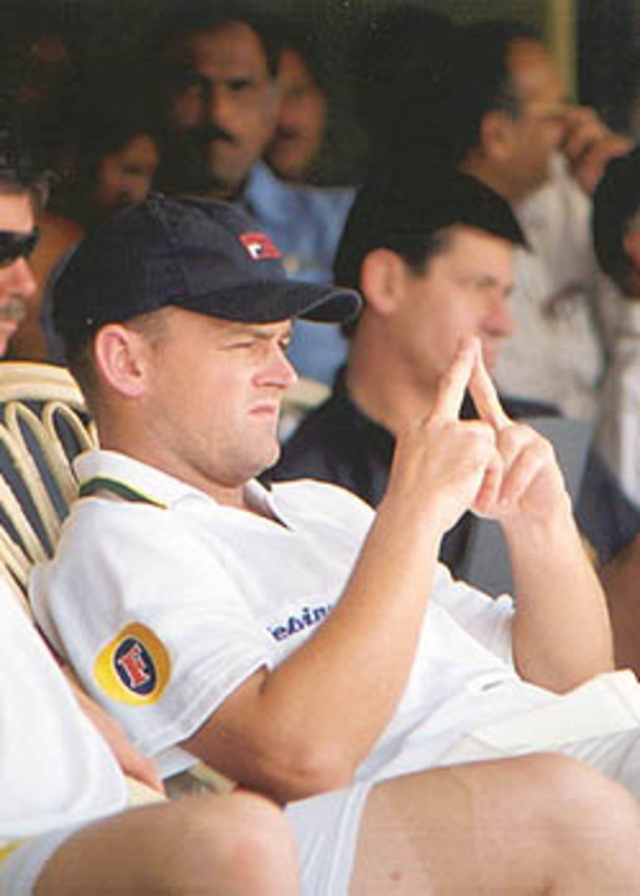 Adam Gilchrist watches the proceedings keenly from the confines of the stands, Australia in India, 2000/01, India 'A' v Australians, Vidarbha C.A. Ground, Nagpur, 17-19 February 2001.