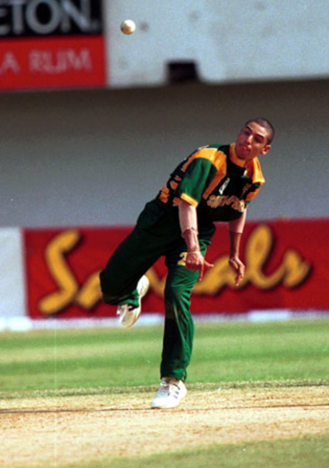 Justin Ontong spinning away, 4th ODI at Queen's Park (New) St George's, Grenada , 6th May 2001
