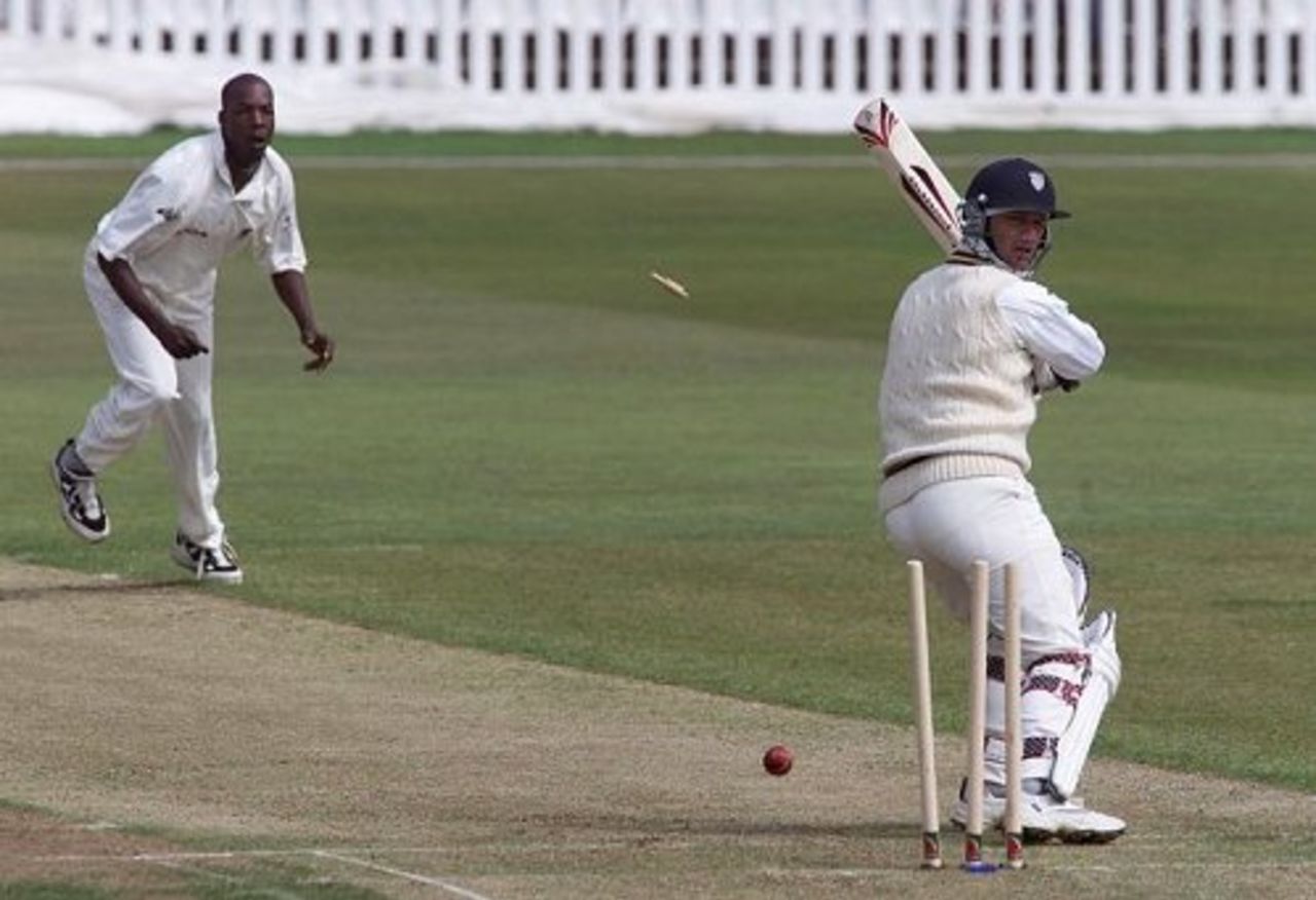 Wed 9 May 2001: Durham's Martin Speight (right) is bowled by Warwickshire's Vaspert Drakes for 4 during the County Championship Division Two game at Edgbaston, Birmingham.