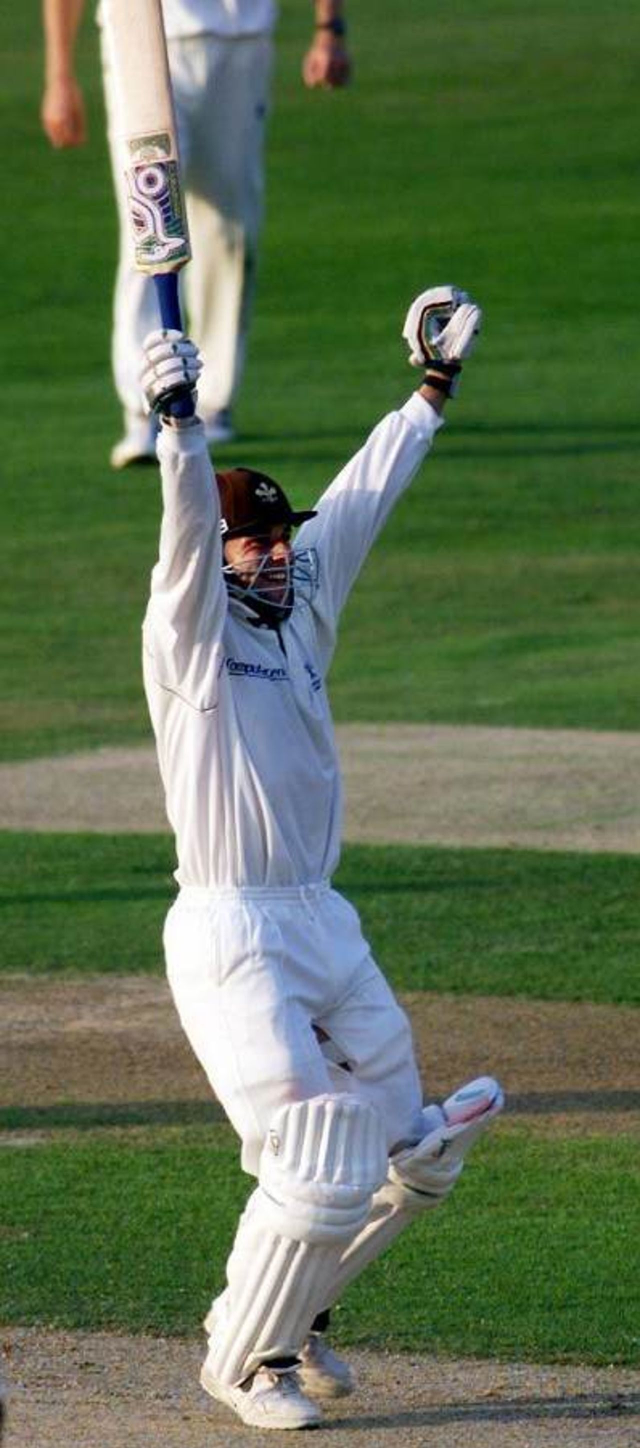 2 Sep 1999: Surrey's Ian Ward celebrates after hitting the winning run to win the County Championship match against Notts, at the Oval.
