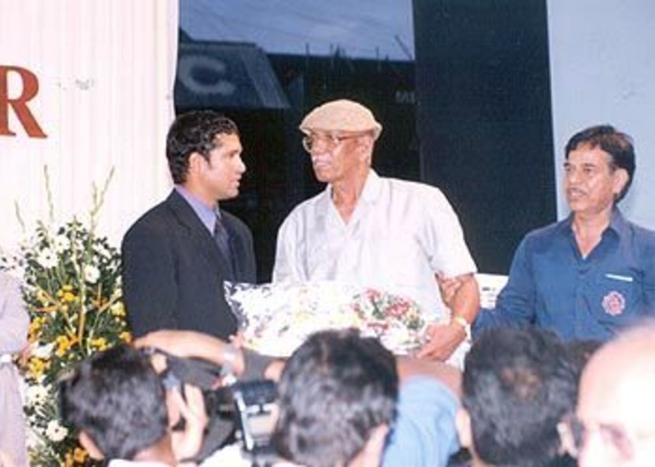 The student in conference with his teacher, Wankhede Stadium, Mumbai, 23 May 2001.