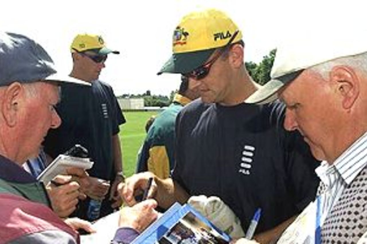 Adam Gilchrist of Australia signs some autographs at New Road, Worcester, England.