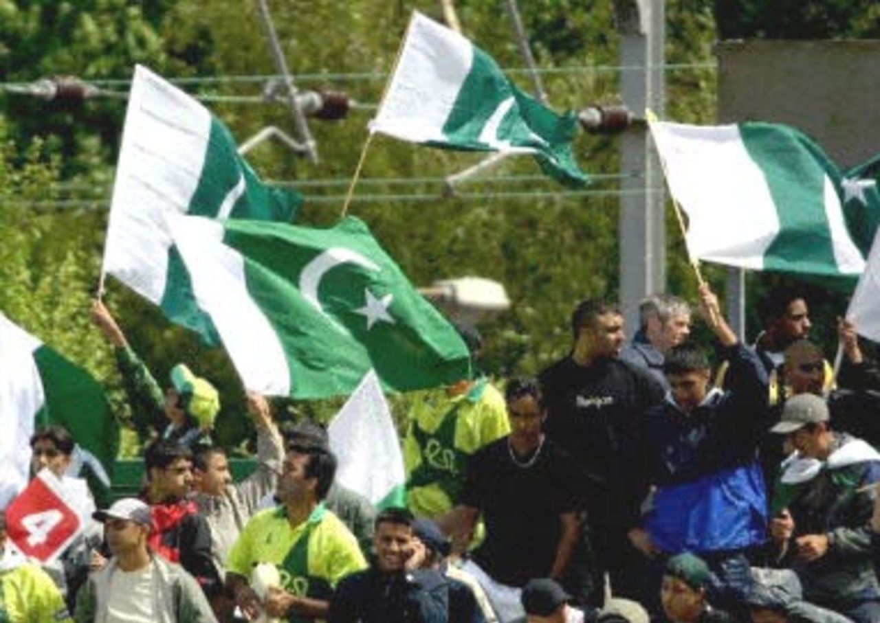 Pakistani cricket fans celebrate Inzamam's 50th run, day 1, 2nd Test at Old Trafford, 31 May - 4 June 2001.