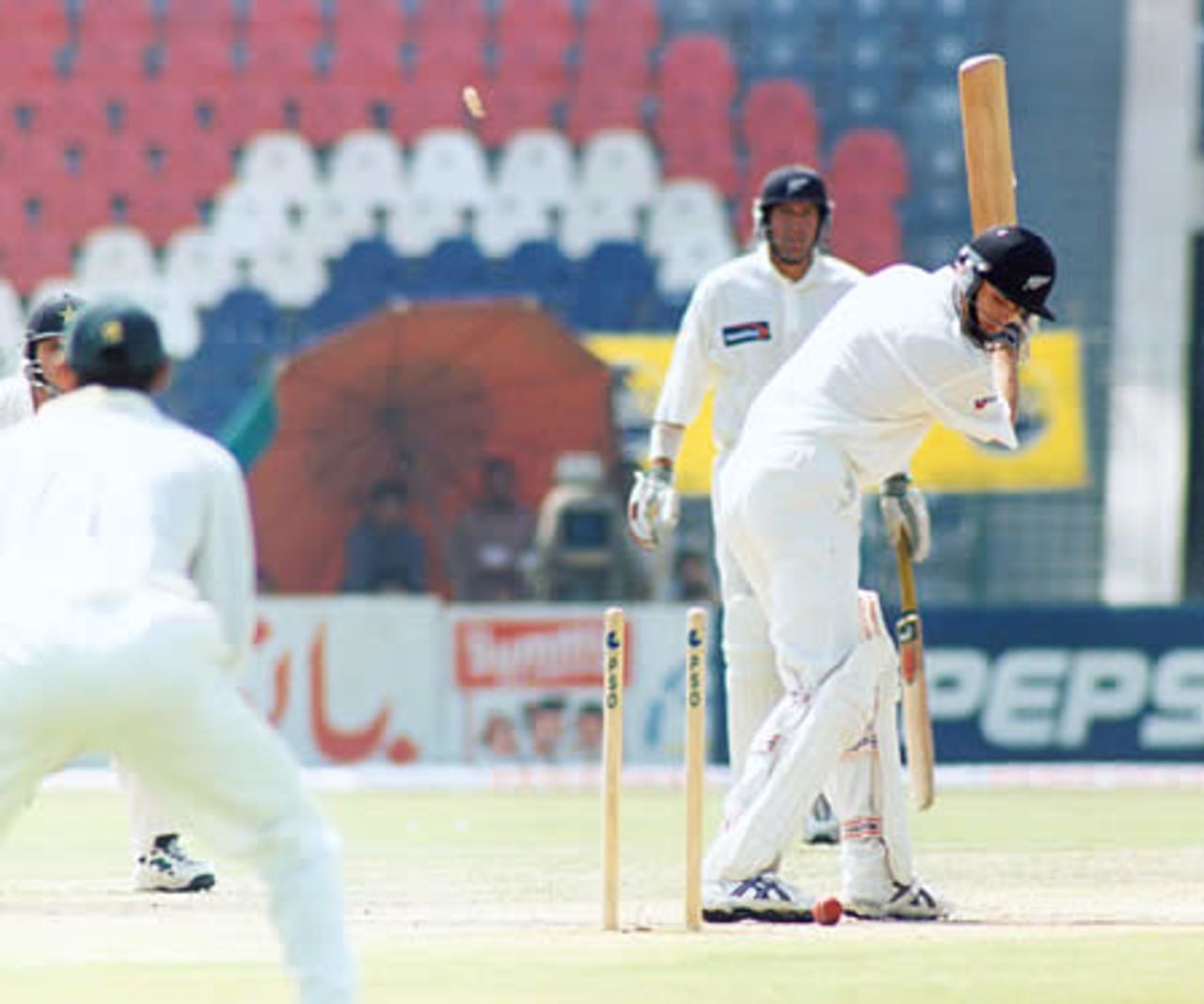 Robbie Hart loses his middle stump and bails - New Zealand second innings, day 3, 1st Test, New Zealand v Pakistan, Gaddafi Stadium Lahore, 3 May 2002