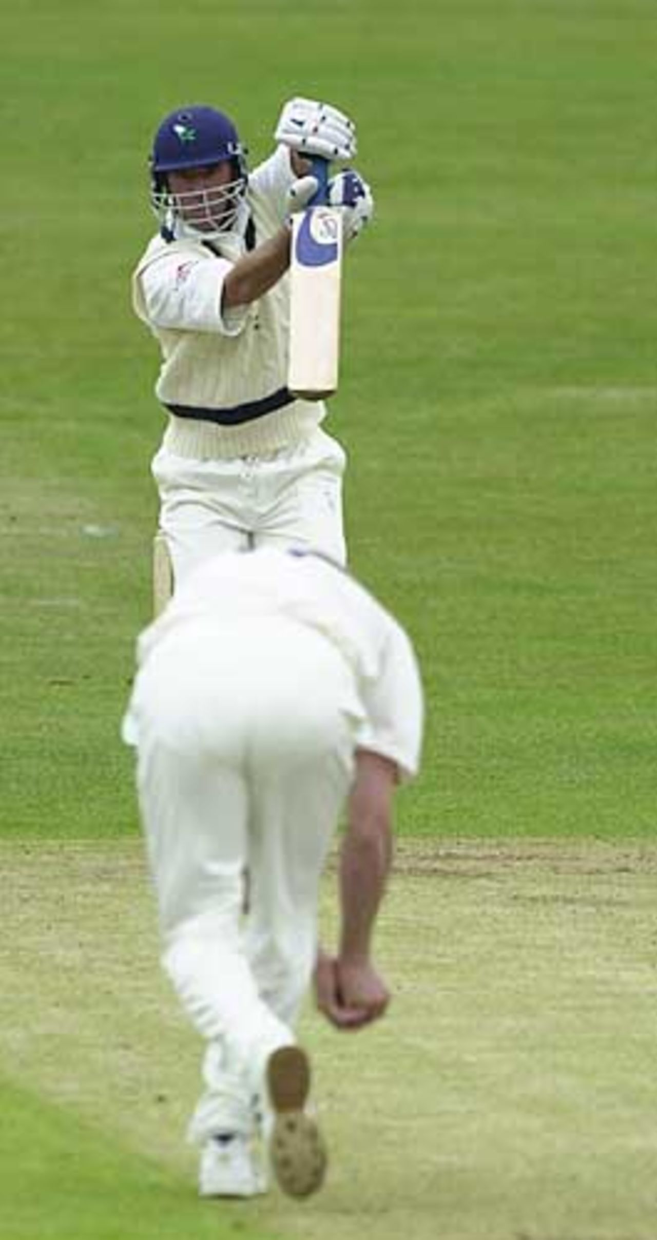 Andy Gray is caught and  bowled Flintoff for 2