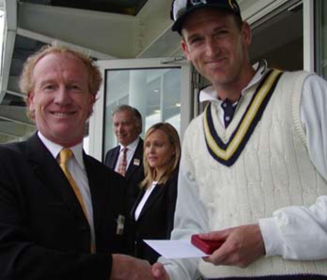 John Crawley receives the Gold Award after his century against Middlesex in the B&H Cup.