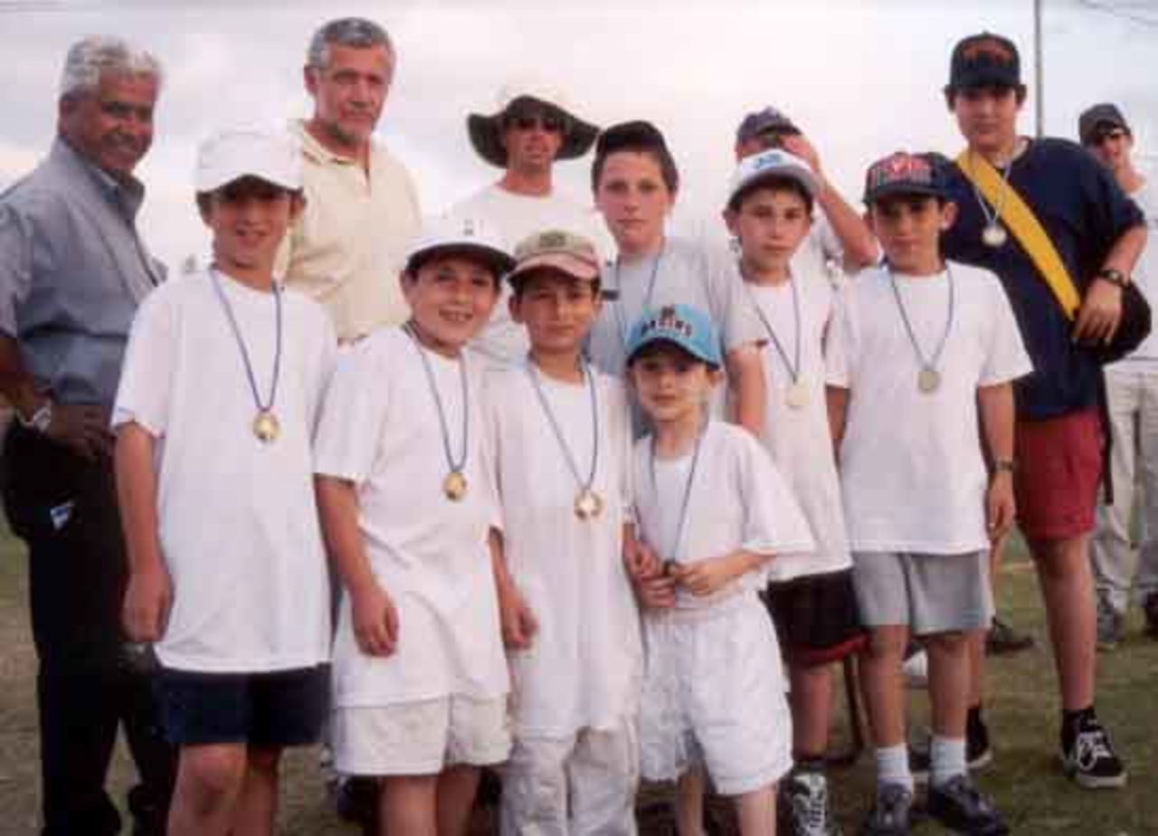Ra'anana players collect their medals having finished joint-winners of Group 3