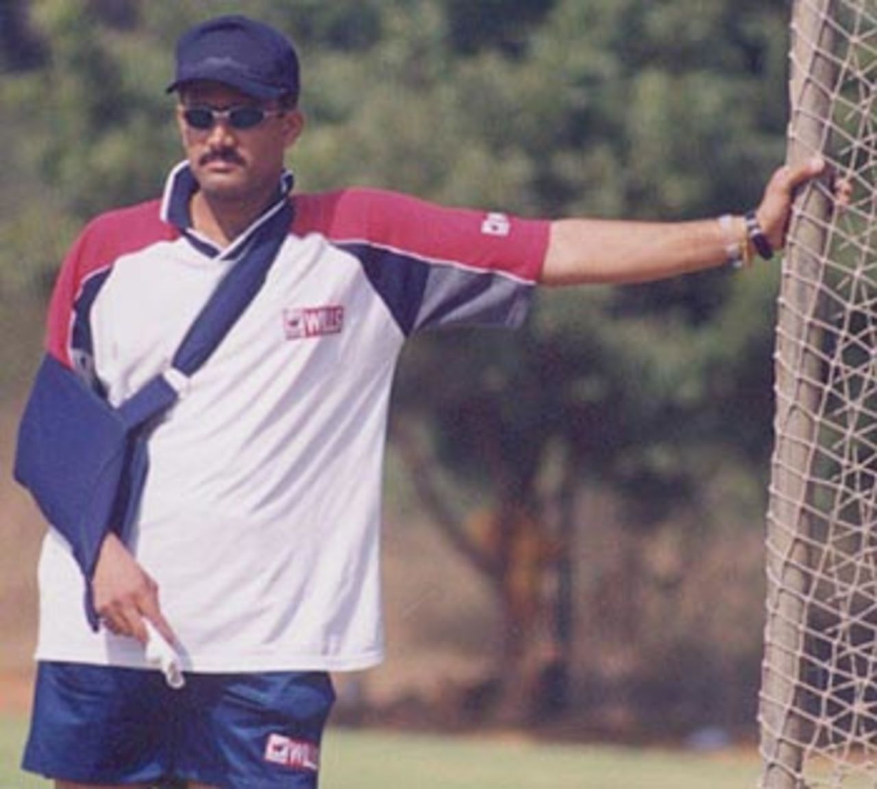 Injured Kumble looks on as the Indians practice